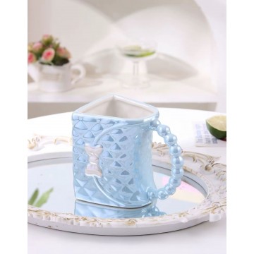 CHOPE CERAMIQUE EN FORME SAC A MAIN POIGNEÈ DORÈ -360ML-   ≡ MINIMALL